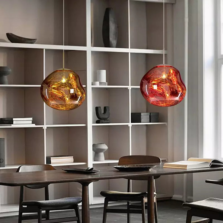 Elegant Melt design hanging light, unique metallic finish, suitable for any modern space.