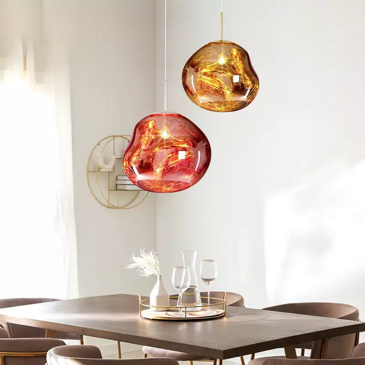 Sophisticated Melt design lamp, reflective metallic sheen, ideal for modern living rooms.