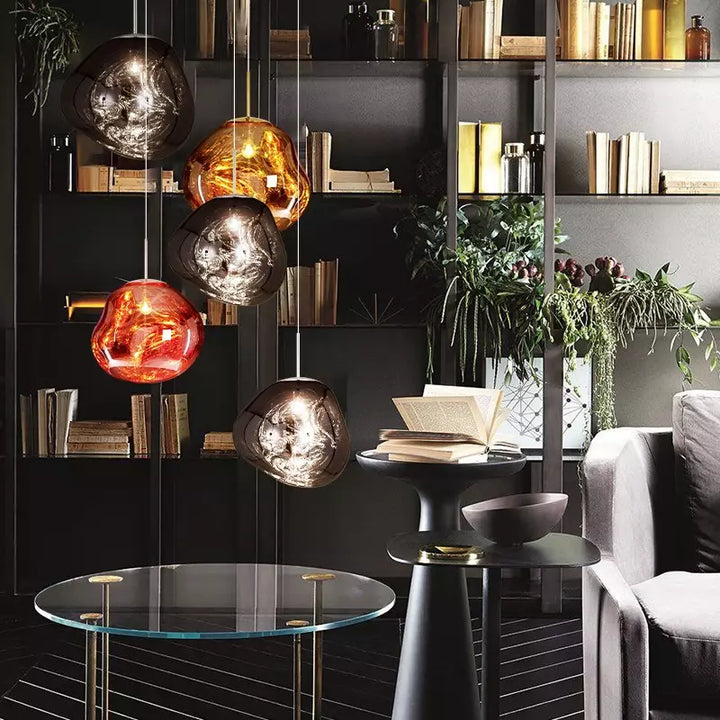 Chic Melt design ceiling lamp, glossy metallic finish, adds a touch of modern elegance.