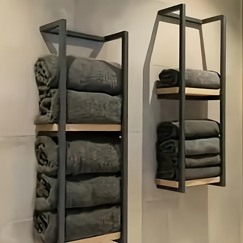 Organize your bathroom with this modern wall-mounted towel rack, a sleek stainless steel space-saving solution.