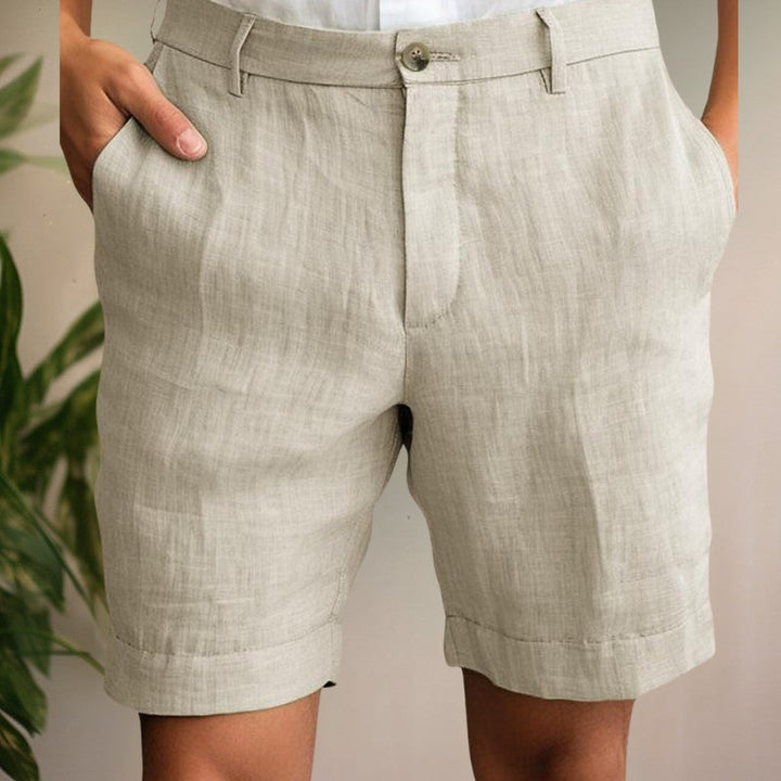 Men's stylish khaki chino shorts for summer. Comfortable, relaxed fit, perfect for casual warm weather fashion.