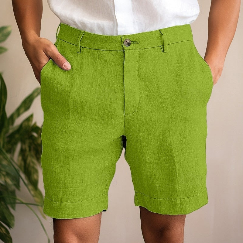 Relaxed fit men's green chino shorts, ideal for warm weather casual fashion and comfortable summer outfits.