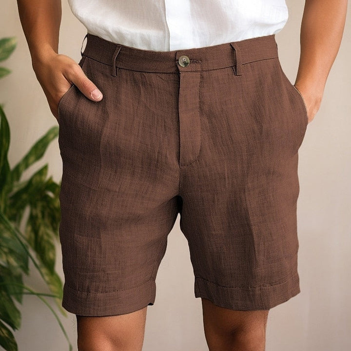 Men's smart casual white chino shorts, perfect for summer comfort and stylish everyday warm weather wear.