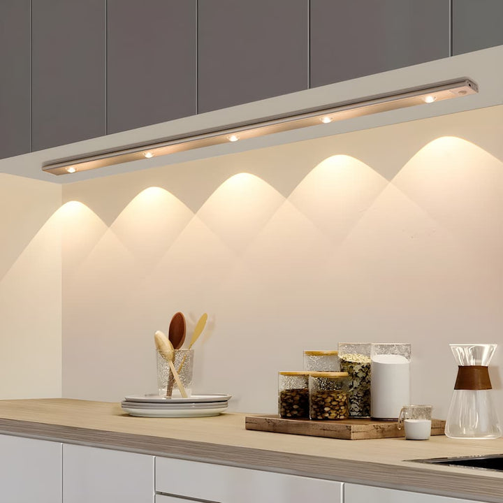 "Motion Sensor LED Light Fixture, wireless, adjustable, sleek design in black, perfect for lighting hallways and living rooms