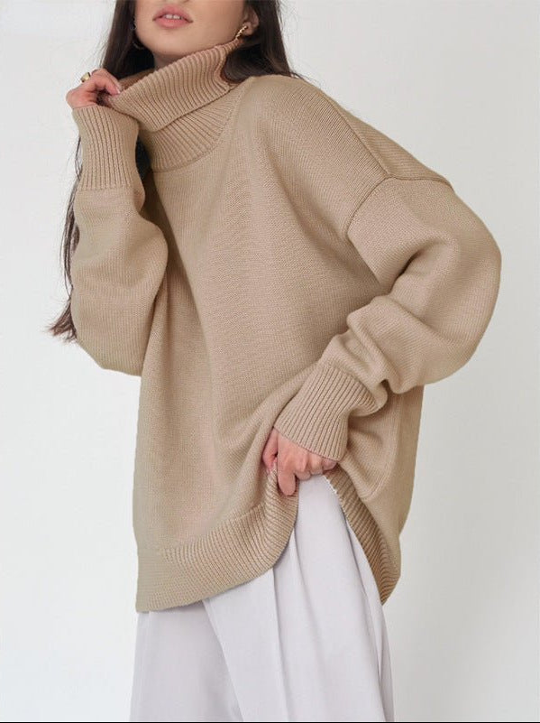 Women's cozy oversized roll neck sweater with a flattering drop shoulder design.
