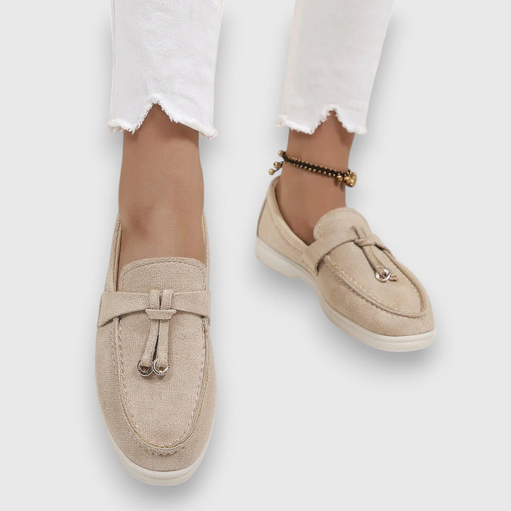 Stylish women's orthopaedic loafers, black, designed for all-day comfort and support. Versatile slip-on footwear.