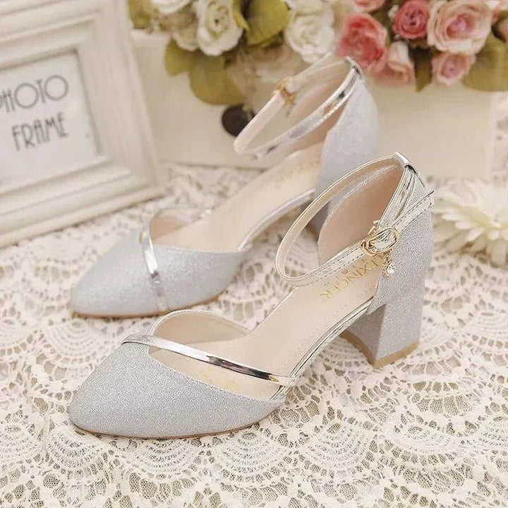 Elegant women's block heel shoes with ankle strap, perfect for formal wear & parties. Comfortable & versatile black design.