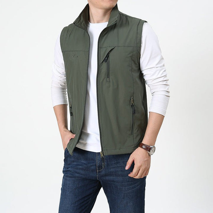 Stylish men's lightweight vest with full zip and stand collar, offering a comfortable and versatile layer for outdoor activities.