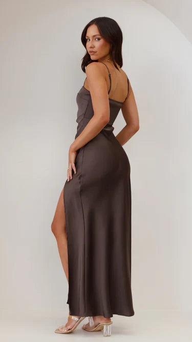Close-up of the elegant square neckline on a women's flattering maxi evening dress. Chic design.