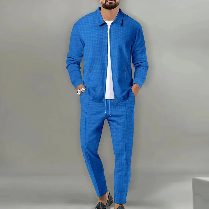 Sharply tailored men's slim fit two-piece suit, exuding effortless style for formal and business occasions.