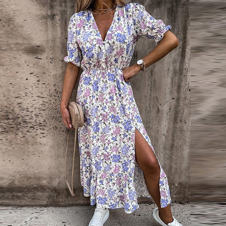 Back view of elegant women's summer midi dress, beautiful floral print & flowing breathable design.