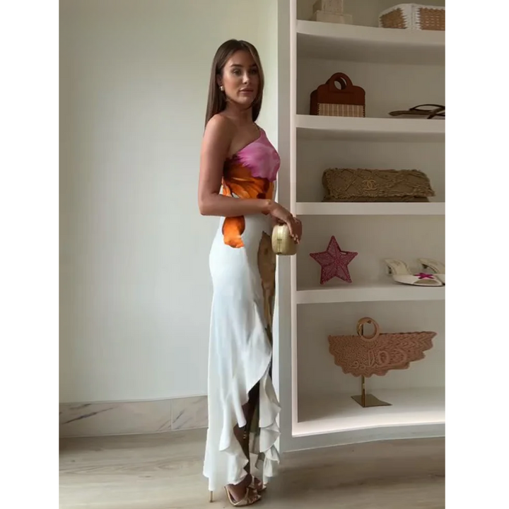 Summer-ready white floral one-shoulder maxi dress for women. An elegant and flowy party dress for warm weather.