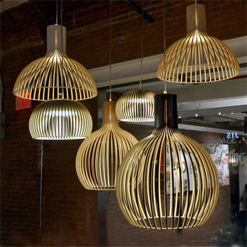 Elegant Natura Orb wooden orb pendant lamp provides warm, natural light for dining rooms or living spaces.