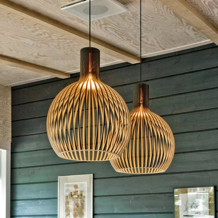 Modern Natura Orb wooden pendant lamp, delivering warm, natural light and unique organic design for any interior.