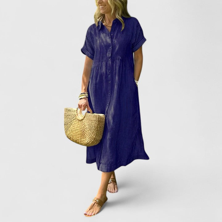 Casual women's vertical stripe midi dress, combining comfort and elegance for a flattering everyday look.