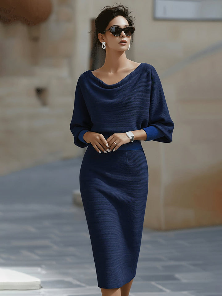 Stylish women's batwing sleeve midi dress, round neck, elegant design for diverse fashion moments.