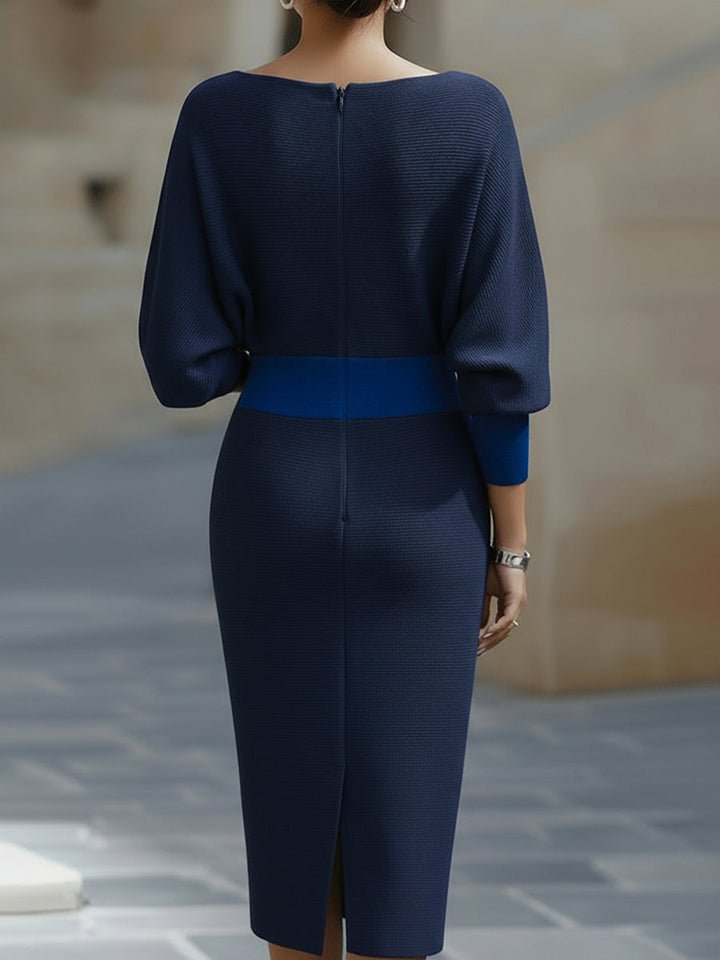Feminine flowy midi dress for women, round neck & batwing sleeves, an elegant choice for spring and summer.