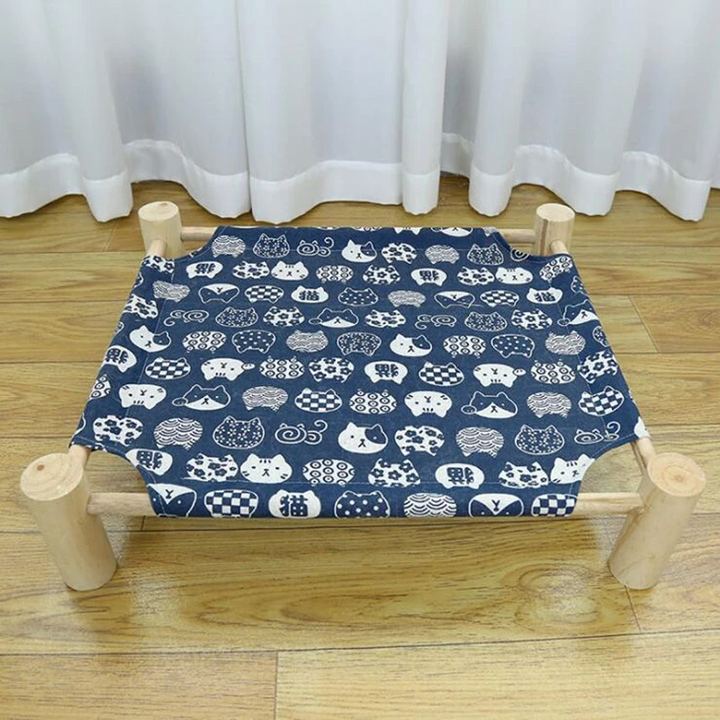 Plush elevated cat bed, a comfortable pet lounge ensuring feline friends a cozy, elevated spot to rest.