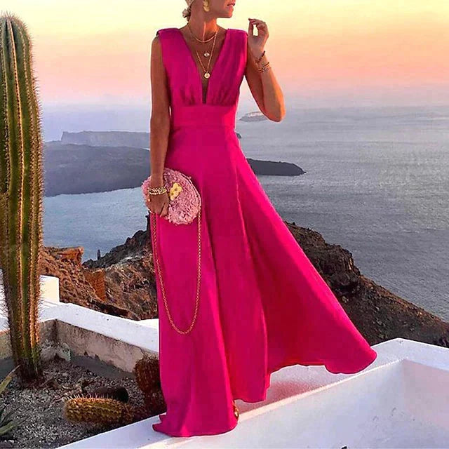 Chic sleeveless V-neck maxi holiday dress for women, ideal for summer events. Figure-flattering & elegant.