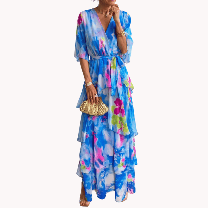 Flattering women's V-neck midi dress in an elegant blue print, suitable for party wear and special occasions.
