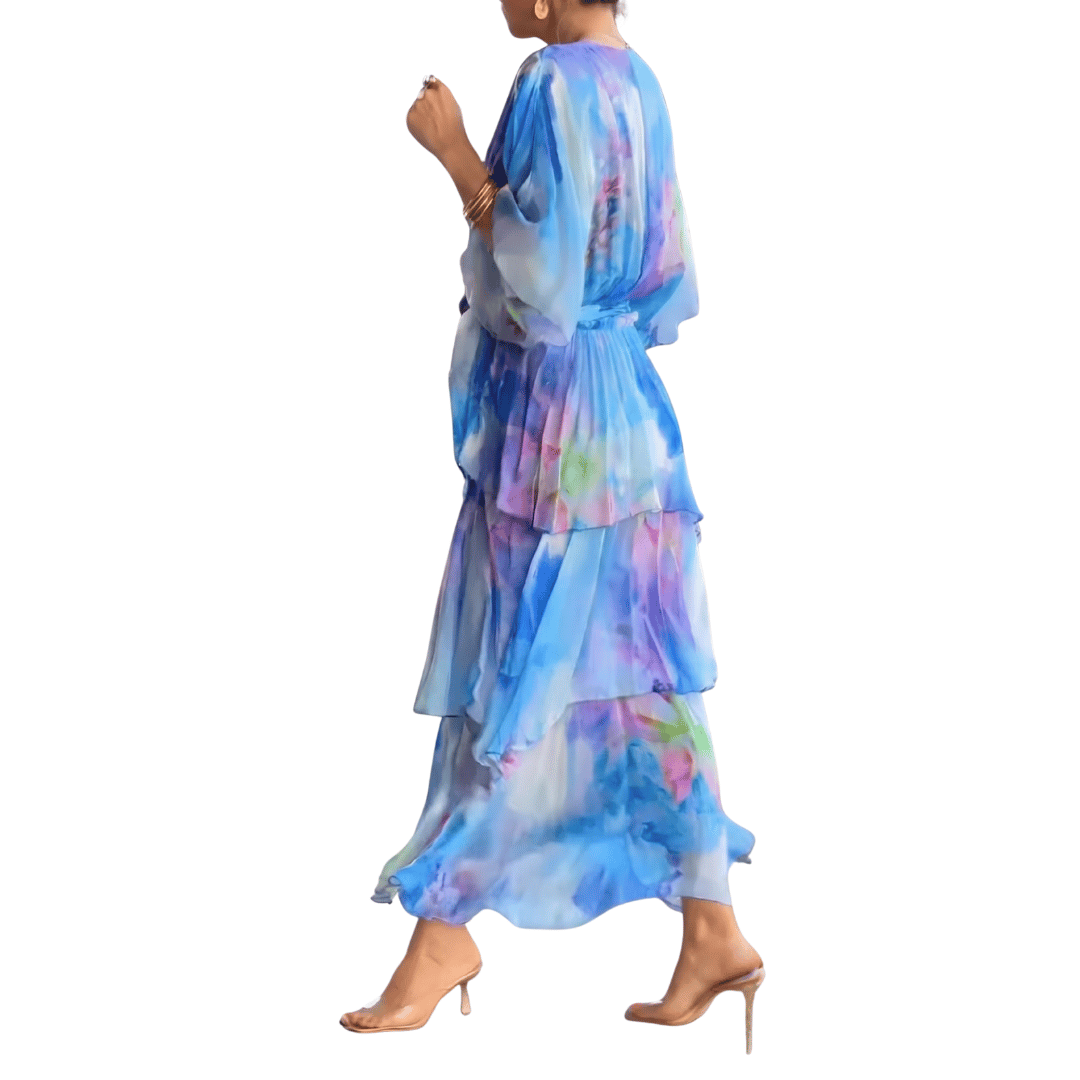 Stylish women's blue print V-neck midi dress with a flattering cut, ideal for elegant cocktail and party events.