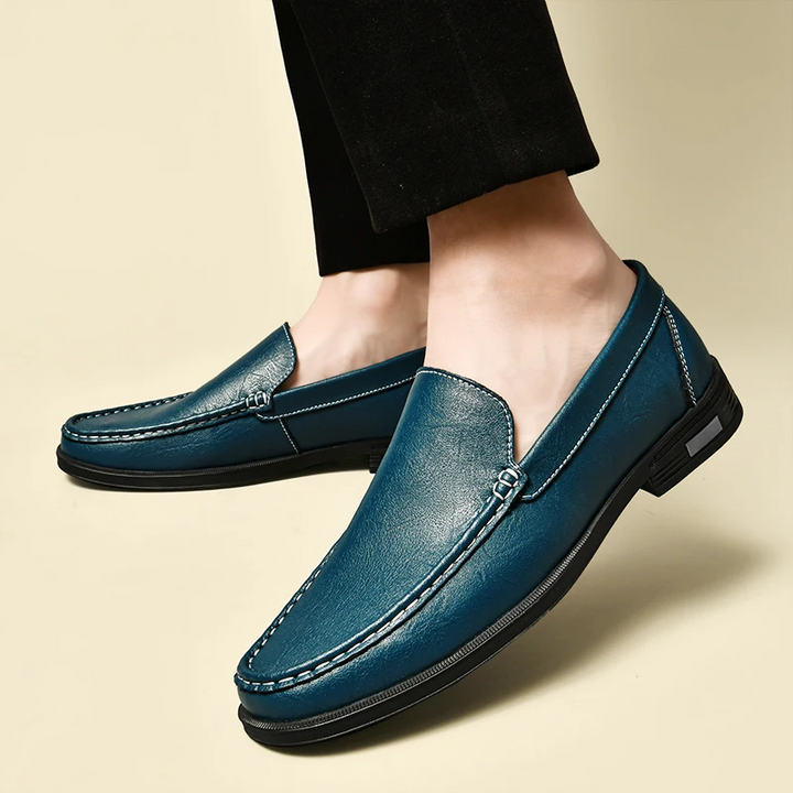 Elegant men's slip-on loafers for timeless style. Perfect for dress shoes or sophisticated casual footwear.