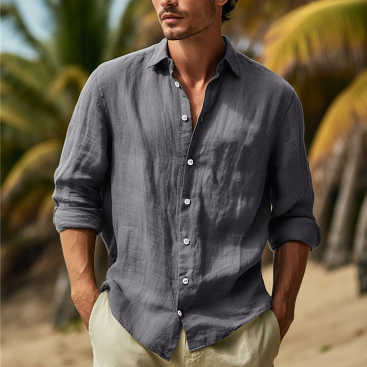 Men's stylish grey long sleeve button-down shirt for casual elegance. Perfect for everyday wear.
