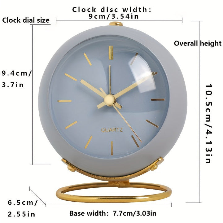 Compact Nordic silent desk clock, luminous hands, metal frame, a stylish study accessory.