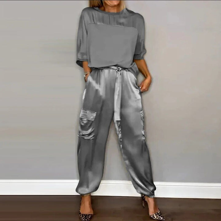 Women's fashion two-piece set, a matching top and utility pocket trousers with a straight leg for casual style.