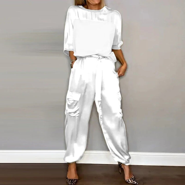 Versatile women's two-piece outfit set featuring utility pocket trousers and a matching top, ideal for casual fashion.