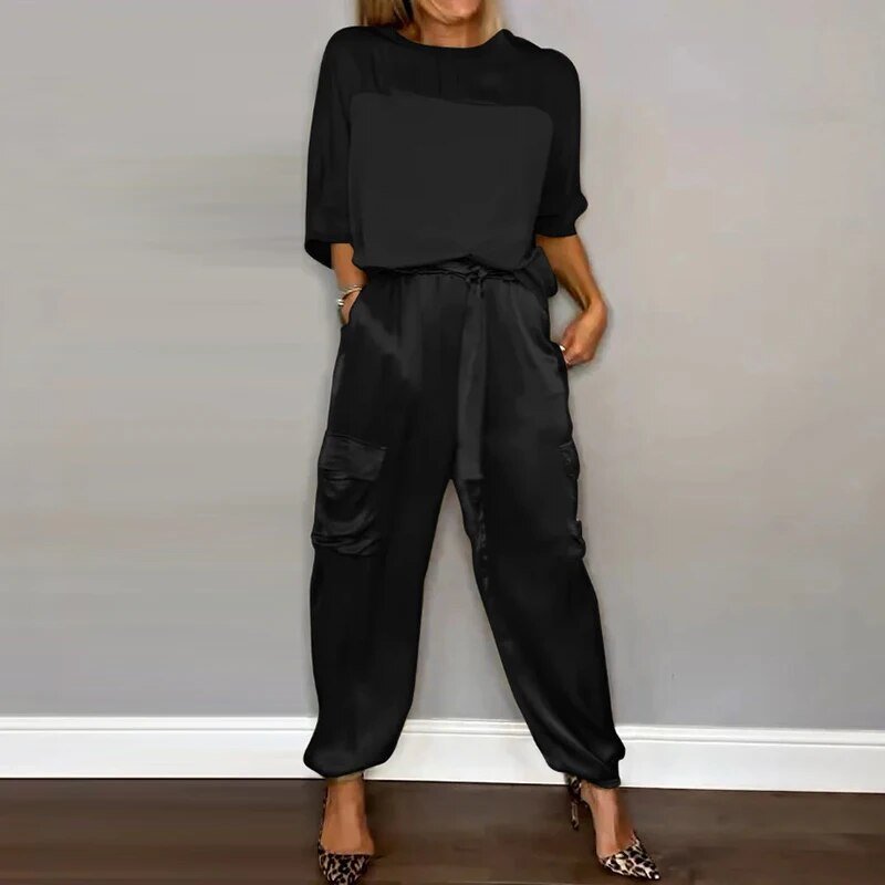 Comfortable women's two-piece matching set with straight leg utility trousers, perfect for versatile everyday wear.