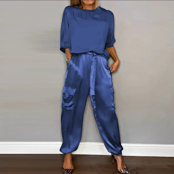 Stylish women's two-piece outfit set, available in plus size, featuring utility trousers for modern casual fashion.