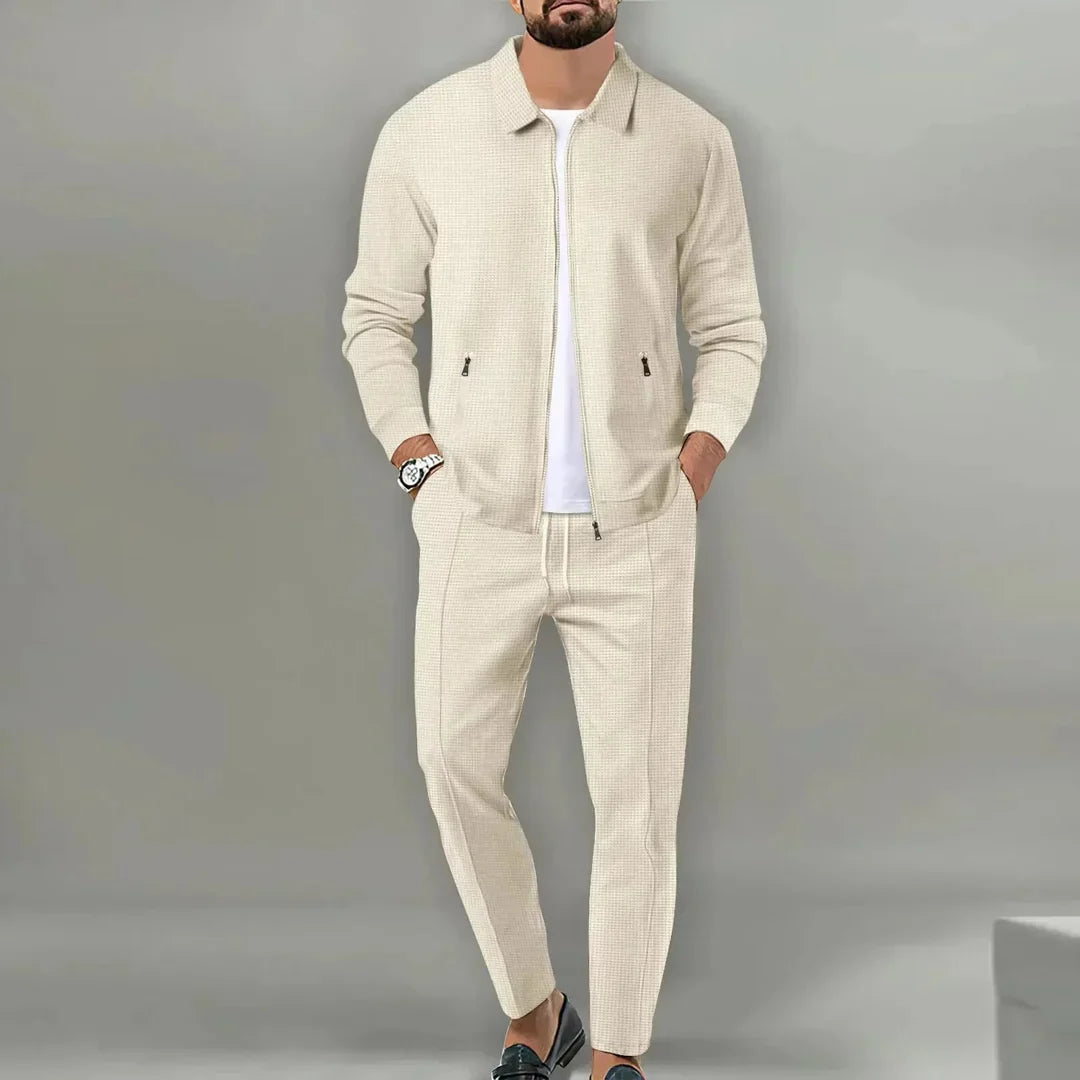 Stylish men's slim fit two-piece suit. Contemporary design, perfect for formal events & modern fashion.