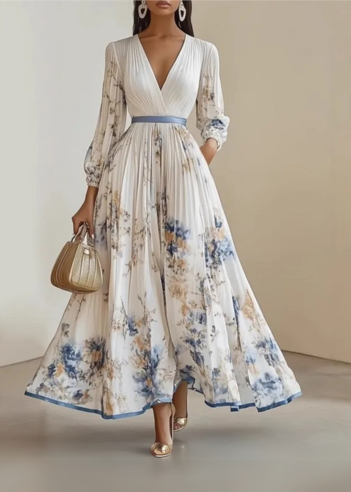 Elegant women's floral maxi dress, perfect for summer occasions. Flowy, comfortable long dress with vibrant print.