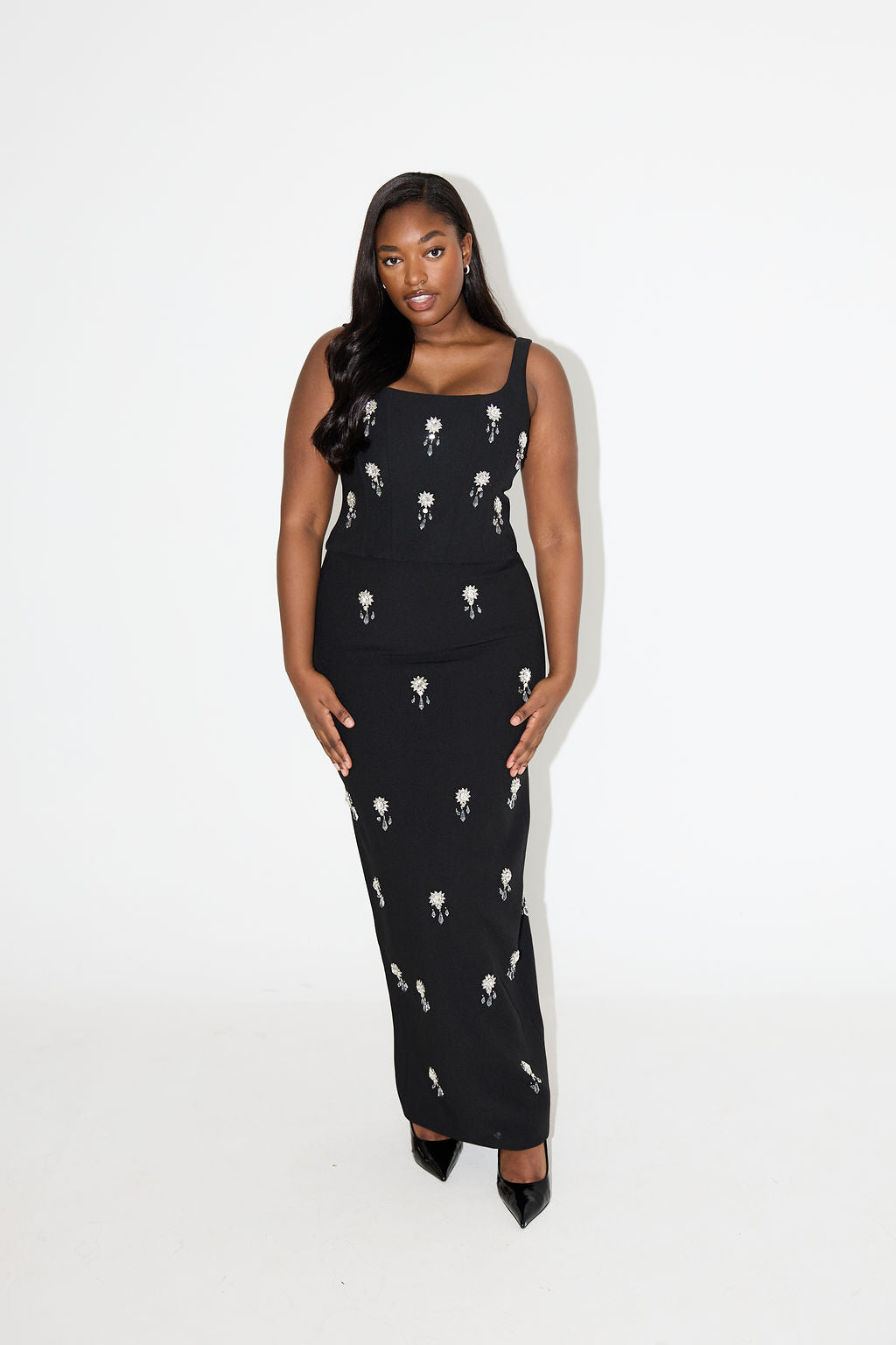 Versatile women's crystal two-piece maxi set, an elegant and glamorous ensemble for special occasion fashion.