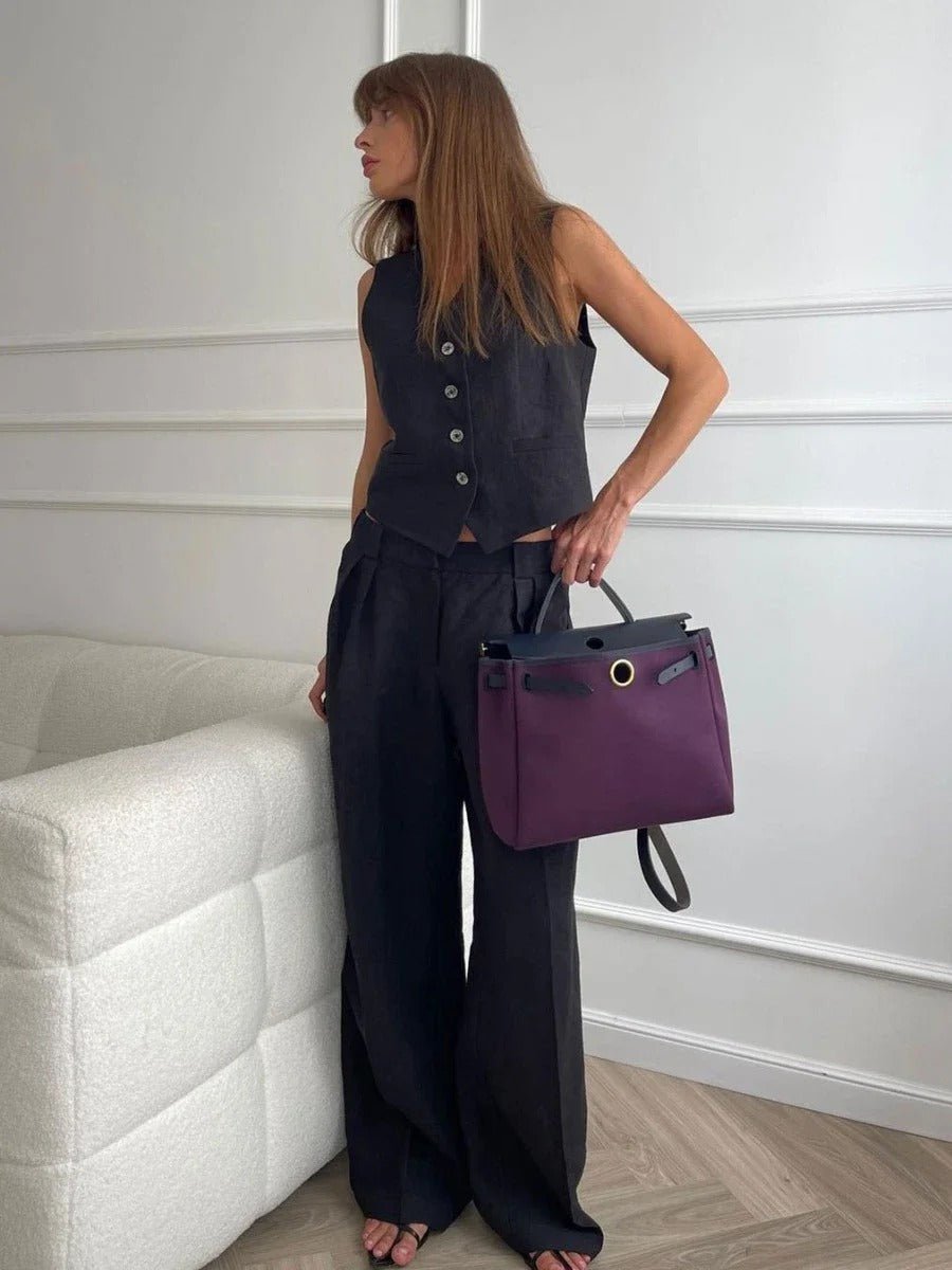 Trendy women's matching set: sleeveless vest and loose wide-leg trousers. Comfortable and stylish for summer fashion.