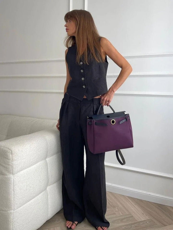 Trendy women's matching set: sleeveless vest and loose wide-leg trousers. Comfortable and stylish for summer fashion.