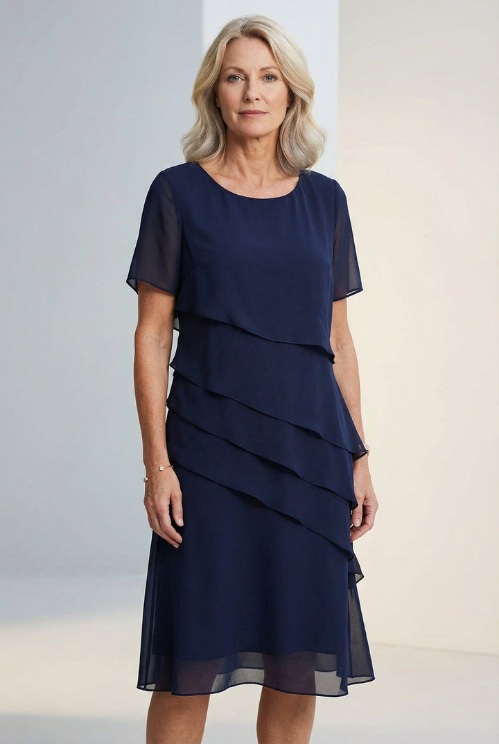 Elegant women's ruffled midi dress with flowing silhouette & sheer sleeves, perfect for spring/summer occasions.