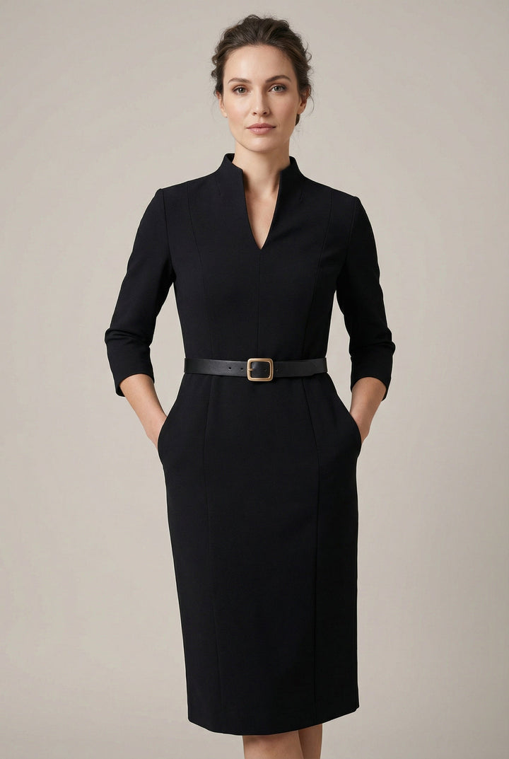 Elegant women's belted midi dress, perfect for professional wear or special occasions, in a timeless tailored style.