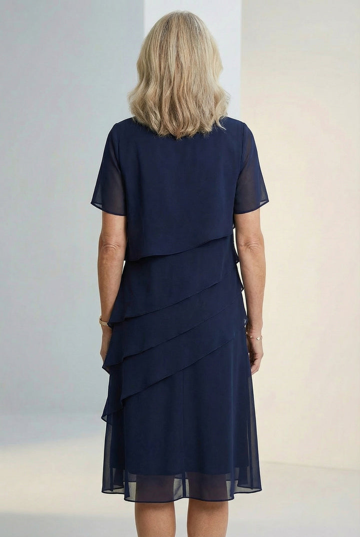 Feminine women's flowing midi dress, ruffled design for effortless style & versatile wear, casual to occasion.