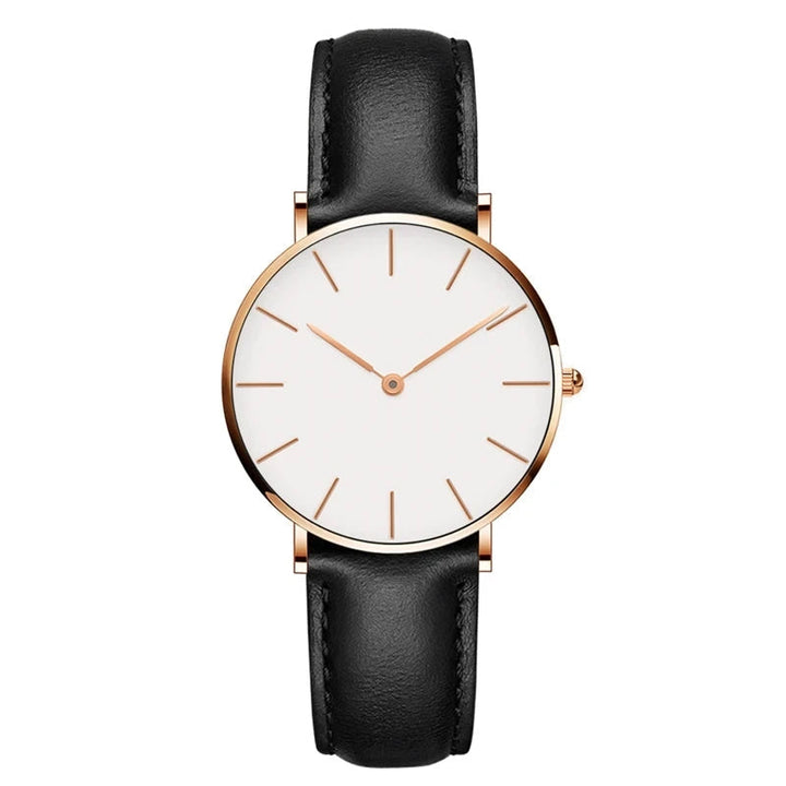 Timeless women's minimalist watch, round face, black leather band, elegant daily wear accessory.