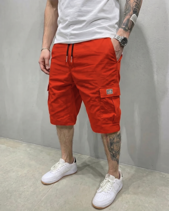 Men's versatile cargo shorts with drawstring waist, relaxed fit, & flap pockets, ideal for casual summer style.