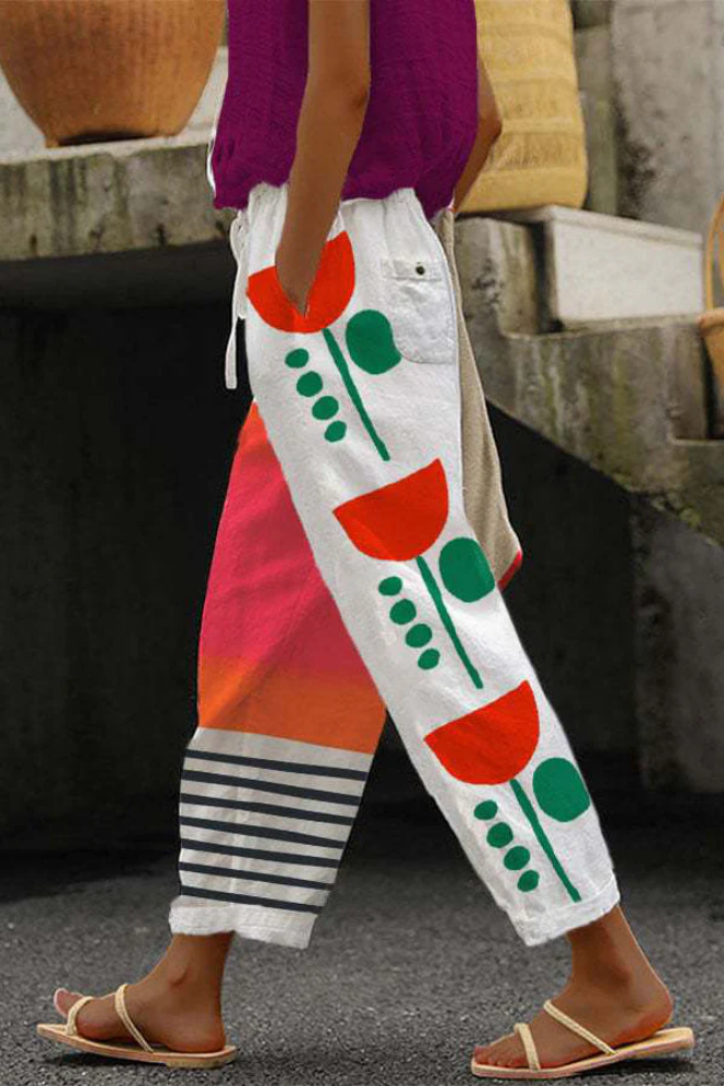 Women's casual printed pants with stylish button and pocket details. Comfortable and versatile fashion bottoms.
