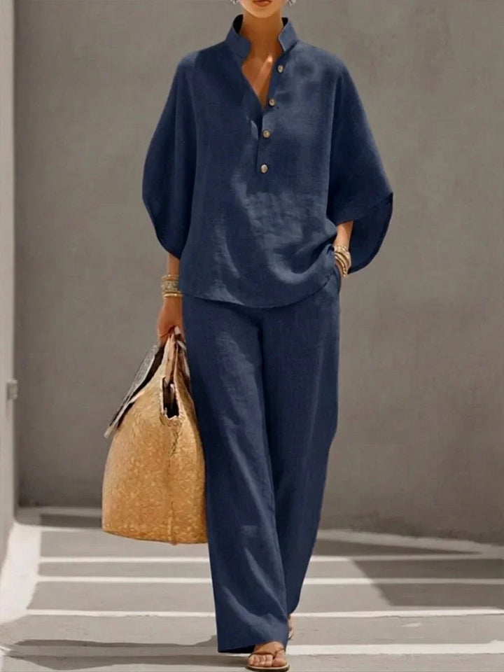 Elegant women's linen set with a comfy batwing top & wide leg trousers. Perfect two-piece summer casual outfit.