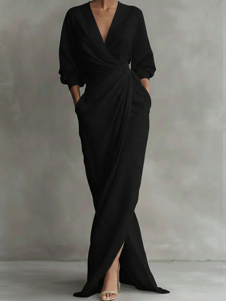 Women's elegant V-neck 3/4 sleeve dress. Loose fit, comfortable, and versatile for day wear in spring/summer.