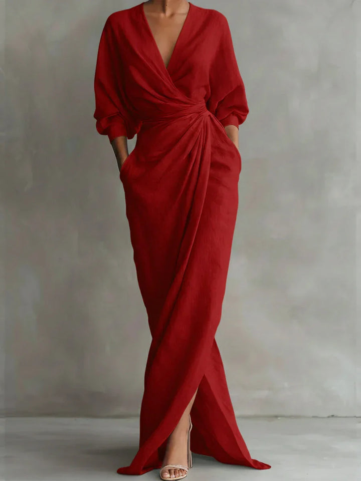 Stylish women's V-neck dress featuring elegant 3/4 sleeves. A versatile, casual dress for spring and summer.