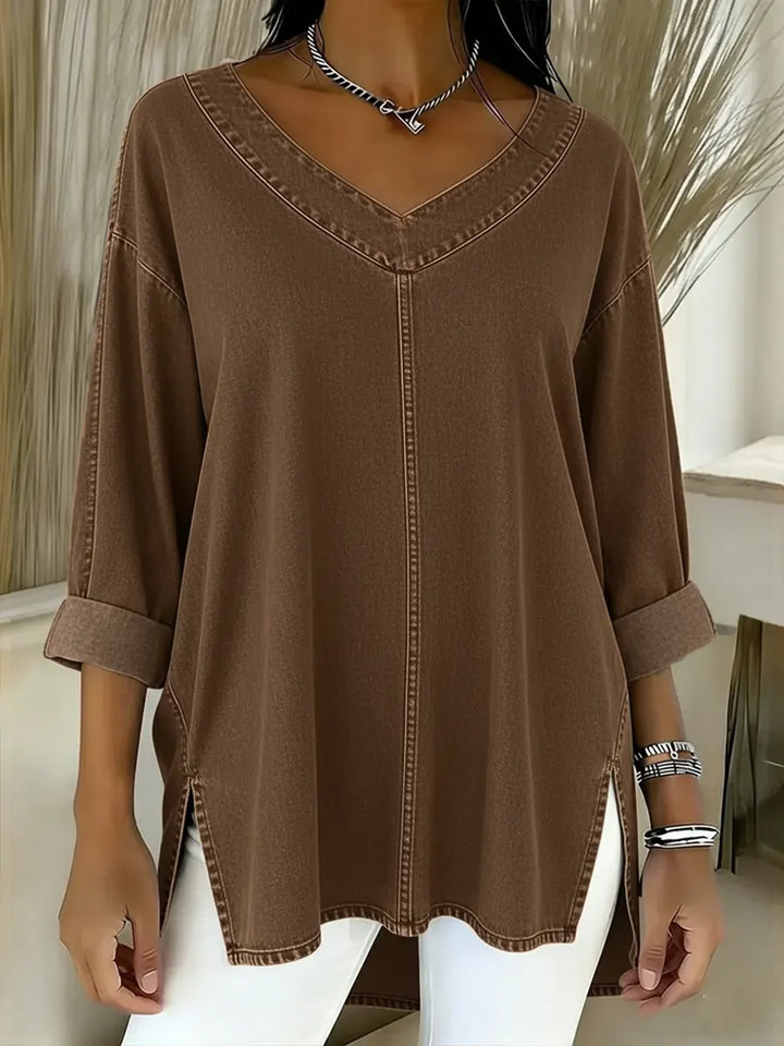 Effortless style: Women's timeless denim shirt, long sleeve, V-neck. Perfect versatile top for daily wear.