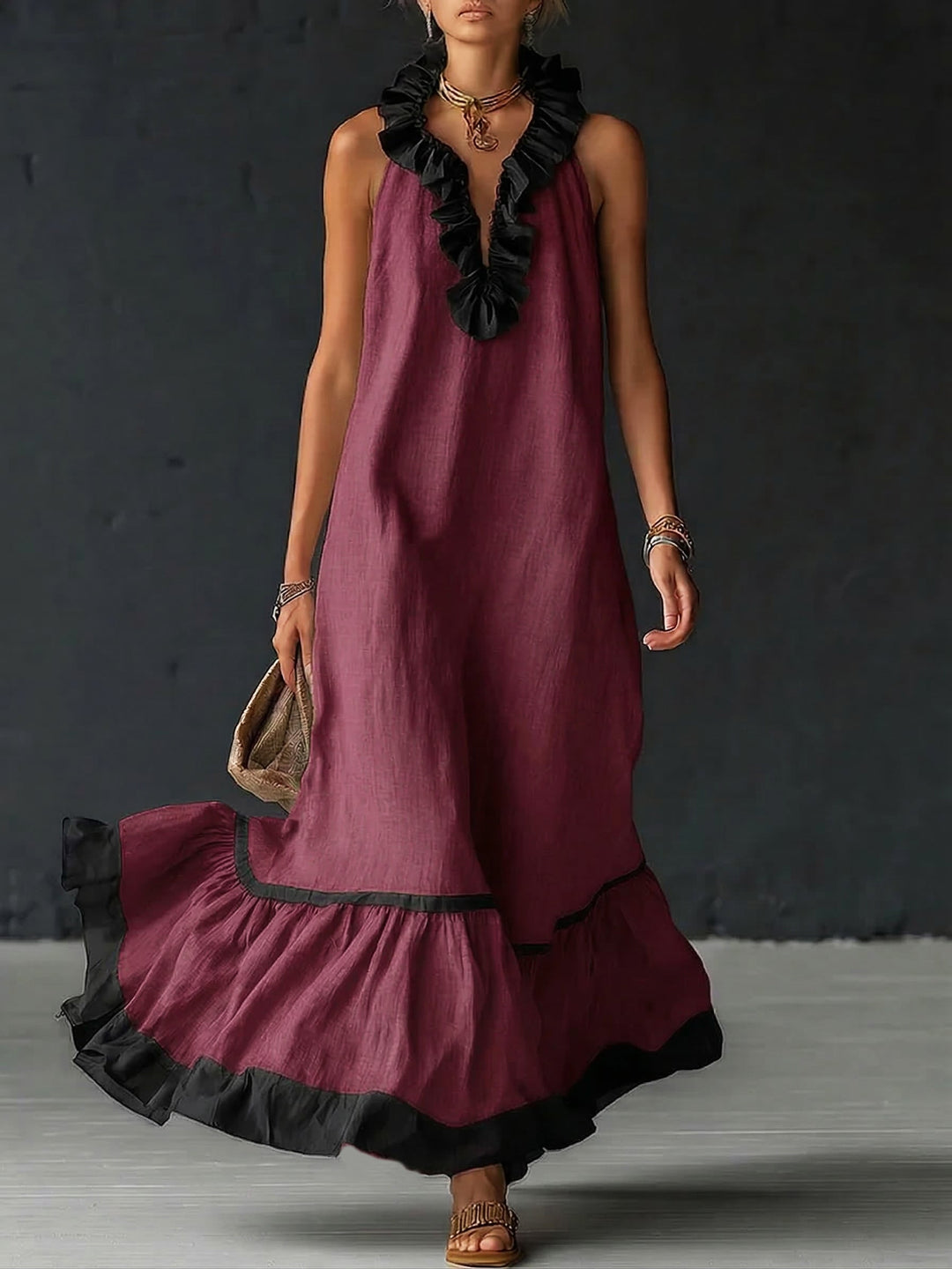 Sophisticated women's color-block maxi dress featuring elegant ruffles and a flattering silhouette.