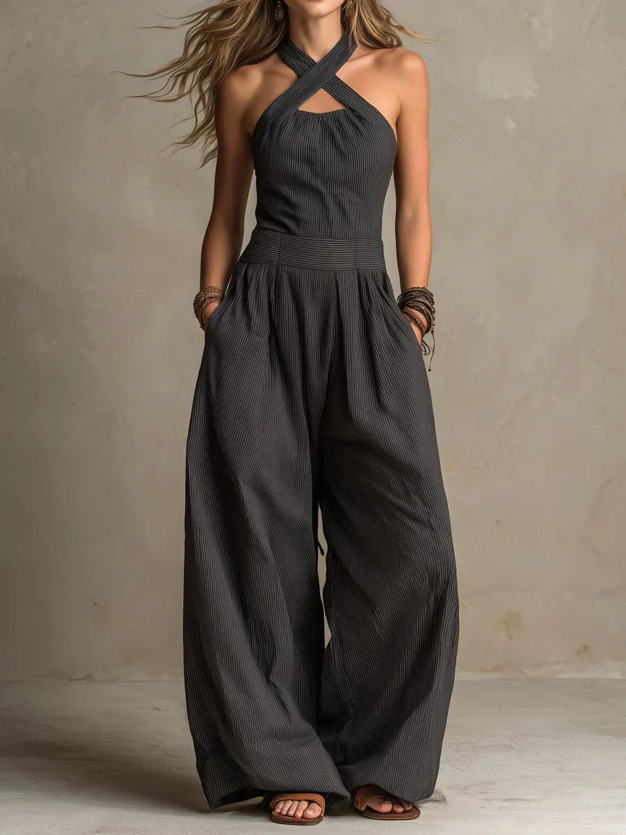 Versatile women's wide-leg jumpsuit with an elegant cross neckline, offering a comfortable and stylish casual-to-formal look.