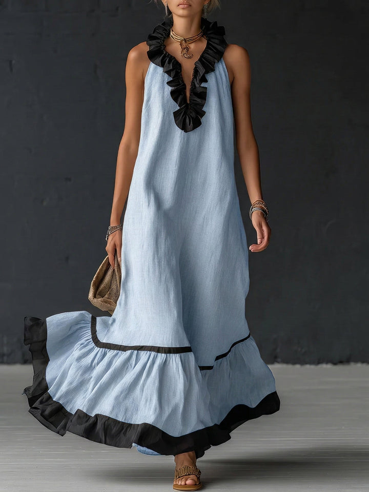 Stunning women's color-block flowing maxi dress with elegant ruffles, a summer fashion essential.